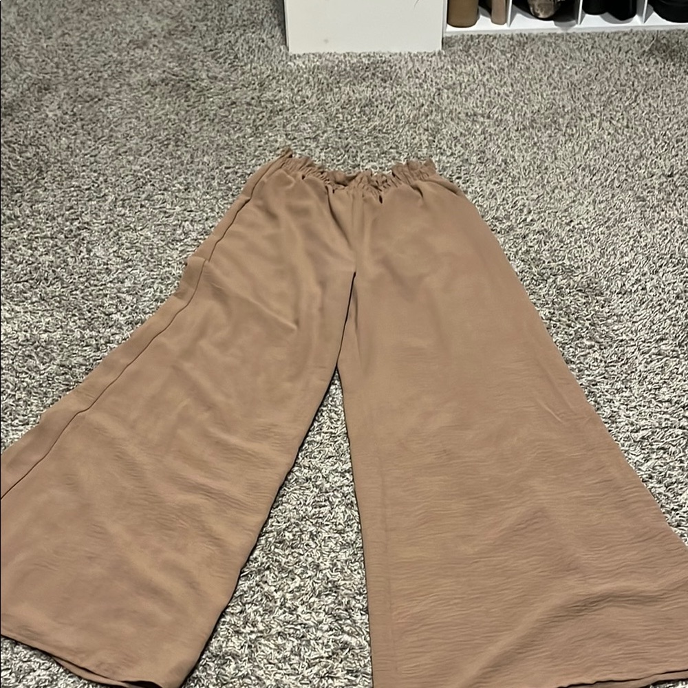 Never worn (no tags) flowy Altar’d State pants in medium